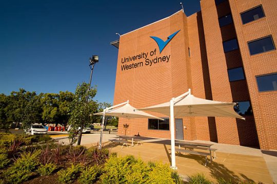 Sydney, Australia - January 14, 2014:  Various plants and gazebos before Building EB at the University of Western Sydney (UWS)'s Parramatta campus.